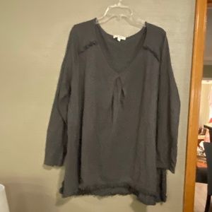 Grey top with inverted front pleat and purposeful
